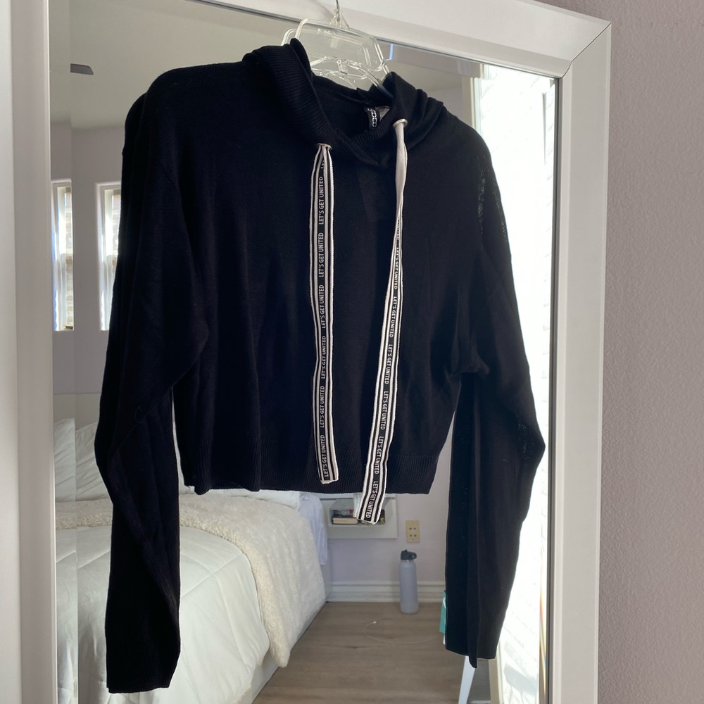Divided hoodie NTW with printed strings. Size XS perfect condition.